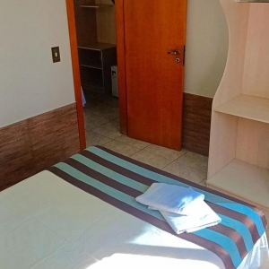 Ambiente de casal | quarto conjugado | Vila dos Pássaros